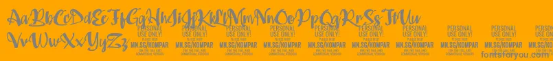 Kompar Bold PERSONAL USE ONLY-Schriftart – Graue Schriften auf orangefarbenem Hintergrund