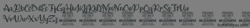 フォントKompar Medium PERSONAL USE ONLY – 黒い文字の灰色の背景