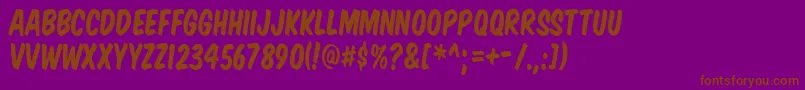 KOMTIT  -fontti – ruskeat fontit violetilla taustalla