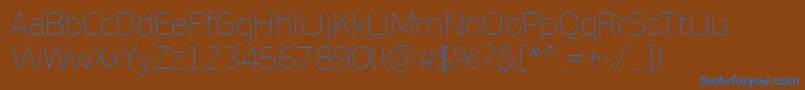 PfbeausansproXthin Font – Blue Fonts on Brown Background