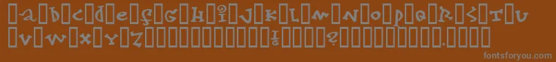フォントkonfekt – 茶色の背景に灰色の文字