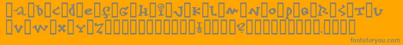 konfekt-Schriftart – Graue Schriften auf orangefarbenem Hintergrund