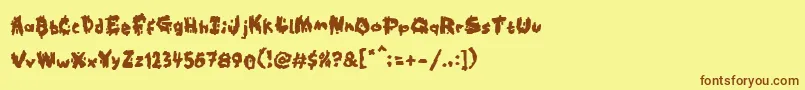 Kookaburra-Schriftart – Braune Schriften auf gelbem Hintergrund