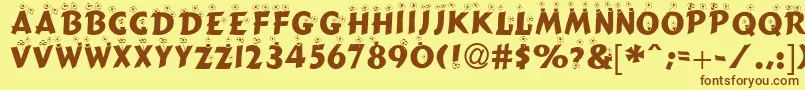 BlMchenNormalDb Font – Brown Fonts on Yellow Background