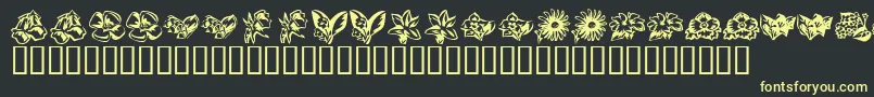 フォントKR Beautiful Flowers 3 – 黒い背景に黄色の文字