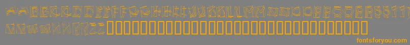 フォントKR Boxy – オレンジの文字は灰色の背景にあります。