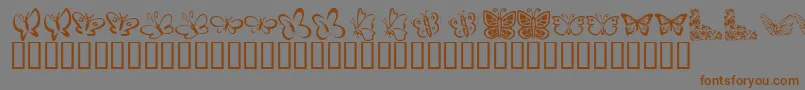 KR Butterflies Font – Brown Fonts on Gray Background