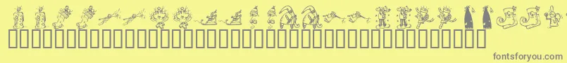 KR Christmas 2002 Dings 2 Font – Gray Fonts on Yellow Background