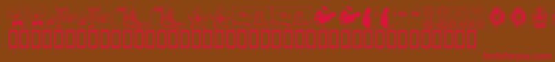 フォントKR Christmas 2002 Dings 5 – 赤い文字が茶色の背景にあります。