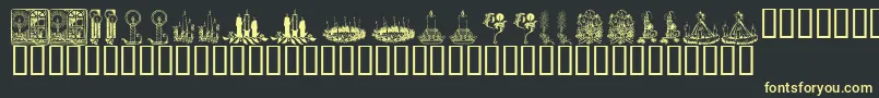 KR Christmas Candles Font – Yellow Fonts on Black Background