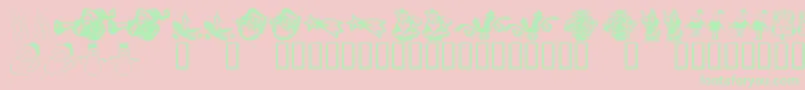 KR Christmas Dings 2004 Six Font – Green Fonts on Pink Background