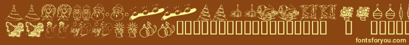 KR Christmas Dings 2004 Two-fontti – keltaiset fontit ruskealla taustalla