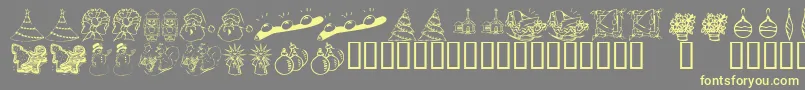 KR Christmas Dings 2004 Two Font – Yellow Fonts on Gray Background