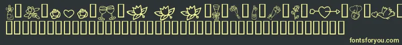 フォントKR Cuori Divertenti 1 – 黒い背景に黄色の文字