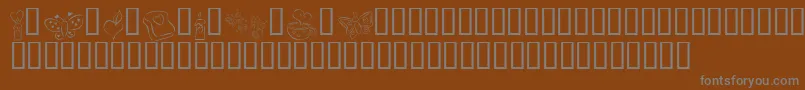 KR Cuori Divertenti 3-Schriftart – Graue Schriften auf braunem Hintergrund