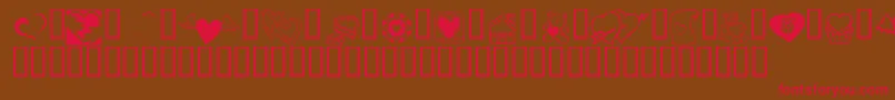 KR Cuori Divertenti 5-Schriftart – Rote Schriften auf braunem Hintergrund