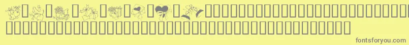 Saiba mais sobre a fonte KR Cuori Divertenti 6 Fonte KR Cuori Divertenti 6 – fontes cinzas em um fundo amarelo