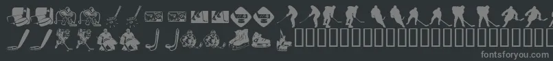 フォントKR Hockey Dings – 黒い背景に灰色の文字