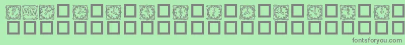 KR Lotsa Time Dings-Schriftart – Graue Schriften auf grünem Hintergrund