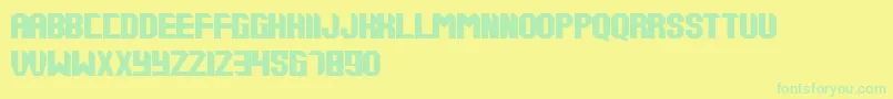 Tups000-Schriftart – Grüne Schriften auf gelbem Hintergrund