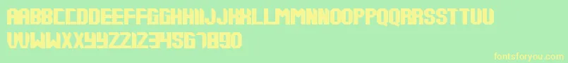 Tups000 Font – Yellow Fonts on Green Background