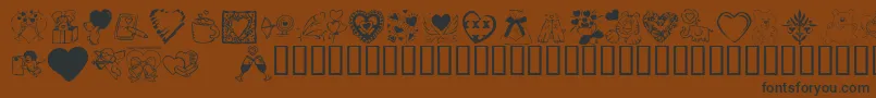 KR Valentine Dings 2002 Font – Black Fonts on Brown Background