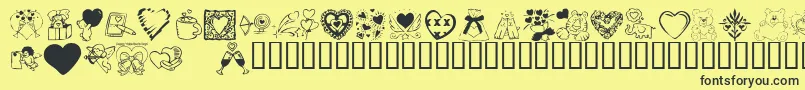 フォントKR Valentine Dings 2002 – 黒い文字の黄色い背景