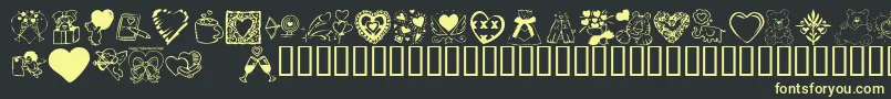 Czcionka KR Valentine Dings 2002 – żółte czcionki na czarnym tle