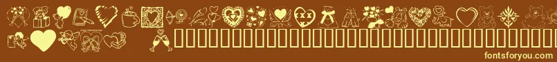 KR Valentine Dings 2002 Font – Yellow Fonts on Brown Background