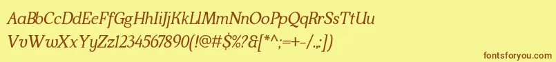 Kraskario italic-fontti – ruskeat fontit keltaisella taustalla