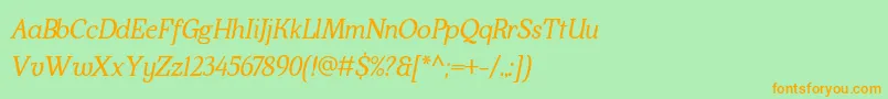 フォントKraskario italic – オレンジの文字が緑の背景にあります。