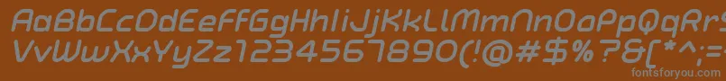 TypoAngularRoundedBoldItalicDemo-fontti – harmaat kirjasimet ruskealla taustalla