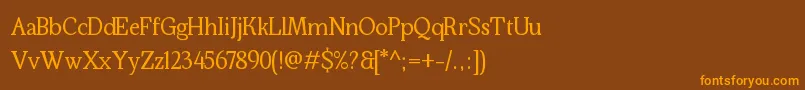 Kraskario-Schriftart – Orangefarbene Schriften auf braunem Hintergrund