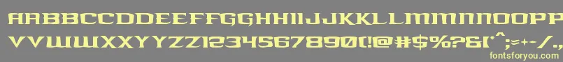 kreaturekombat-Schriftart – Gelbe Schriften auf grauem Hintergrund