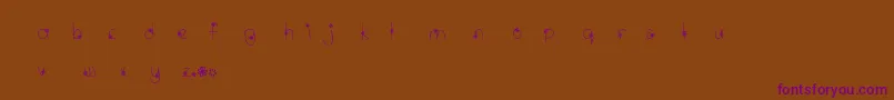 MtfWildflower-fontti – violetit fontit ruskealla taustalla