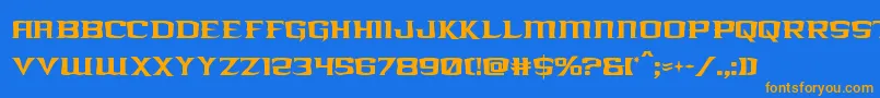 フォントkreaturekombatcond – オレンジ色の文字が青い背景にあります。