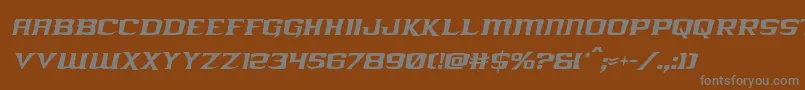 フォントkreaturekombatcondital – 茶色の背景に灰色の文字