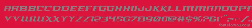 フォントkreaturekombatroughital – 赤い背景に灰色の文字