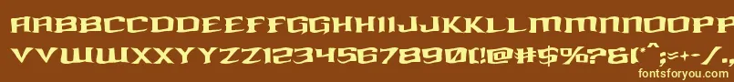 kreaturekombatwarp-fontti – keltaiset fontit ruskealla taustalla