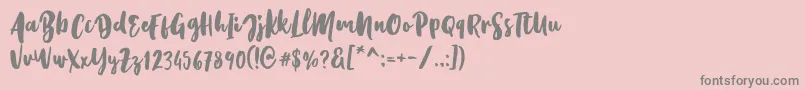 Kristale Script Font – Gray Fonts on Pink Background