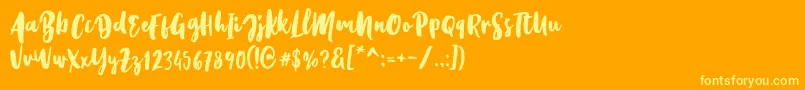 Шрифт Kristale Script – жёлтые шрифты на оранжевом фоне