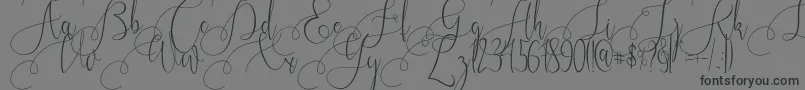 Kristallian Font – Black Fonts on Gray Background