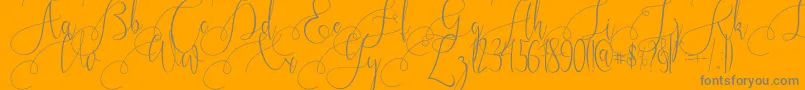 Kristallian-Schriftart – Graue Schriften auf orangefarbenem Hintergrund