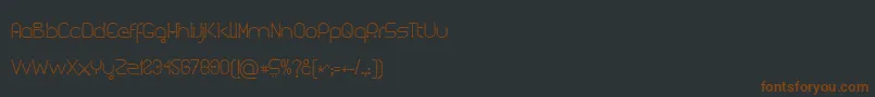Kuasar Font – Brown Fonts on Black Background