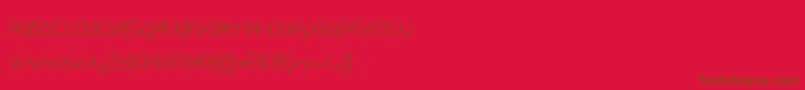 フォントKuasar – 赤い背景に茶色の文字
