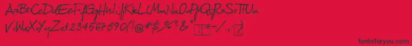 フォントKubaReczny 1 2 – 赤い背景に黒い文字