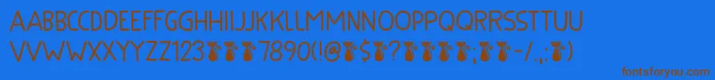 Kuroneko Kaps DEMO Font – Brown Fonts on Blue Background