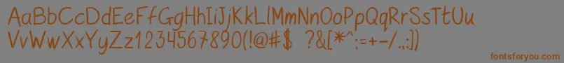 Czcionka kurzetsType v1 4 – brązowe czcionki na szarym tle
