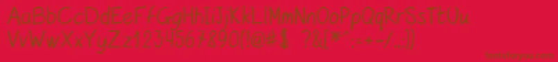 Czcionka kurzetsType v1 4 – brązowe czcionki na czerwonym tle