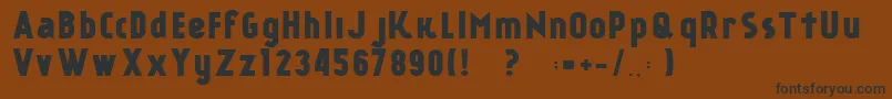 KР°nkinFREE FONT-Schriftart – Schwarze Schriften auf braunem Hintergrund